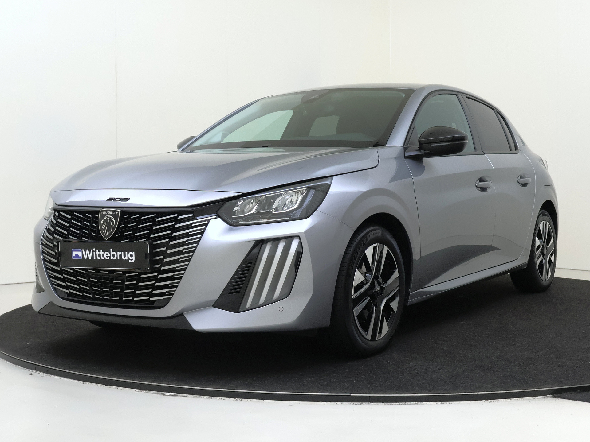 Peugeot 208 1.2 PureTech 100PK Allure Parkeerhulp V&A | Navigatie | Apple Carplay | Cruise Control |