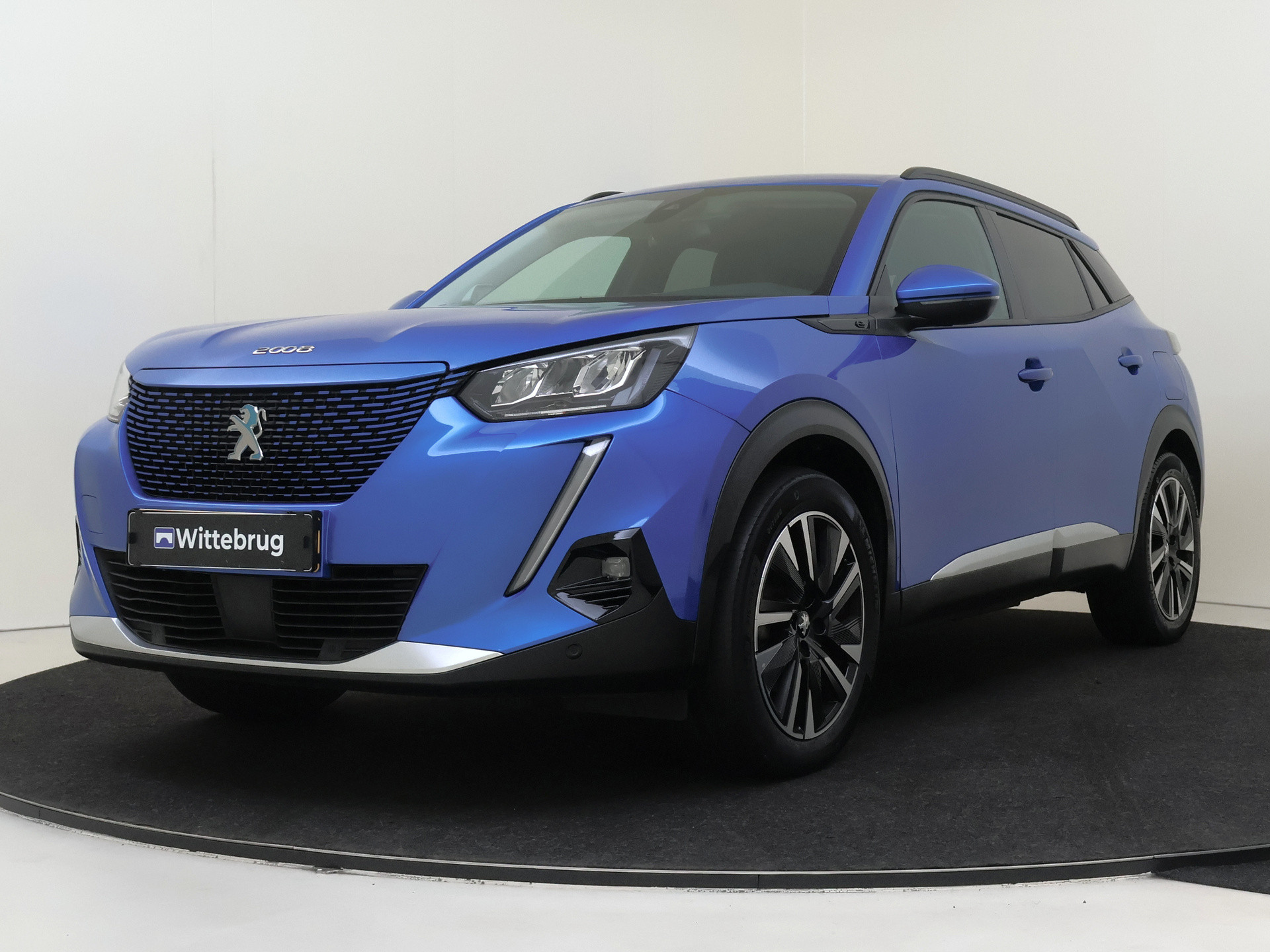 Peugeot e-2008 EV Allure 50 kWh | 50 kWh | Navi | Adaptive Cruise | Stoelverwarming | Keyless | Apple CarPlay YP